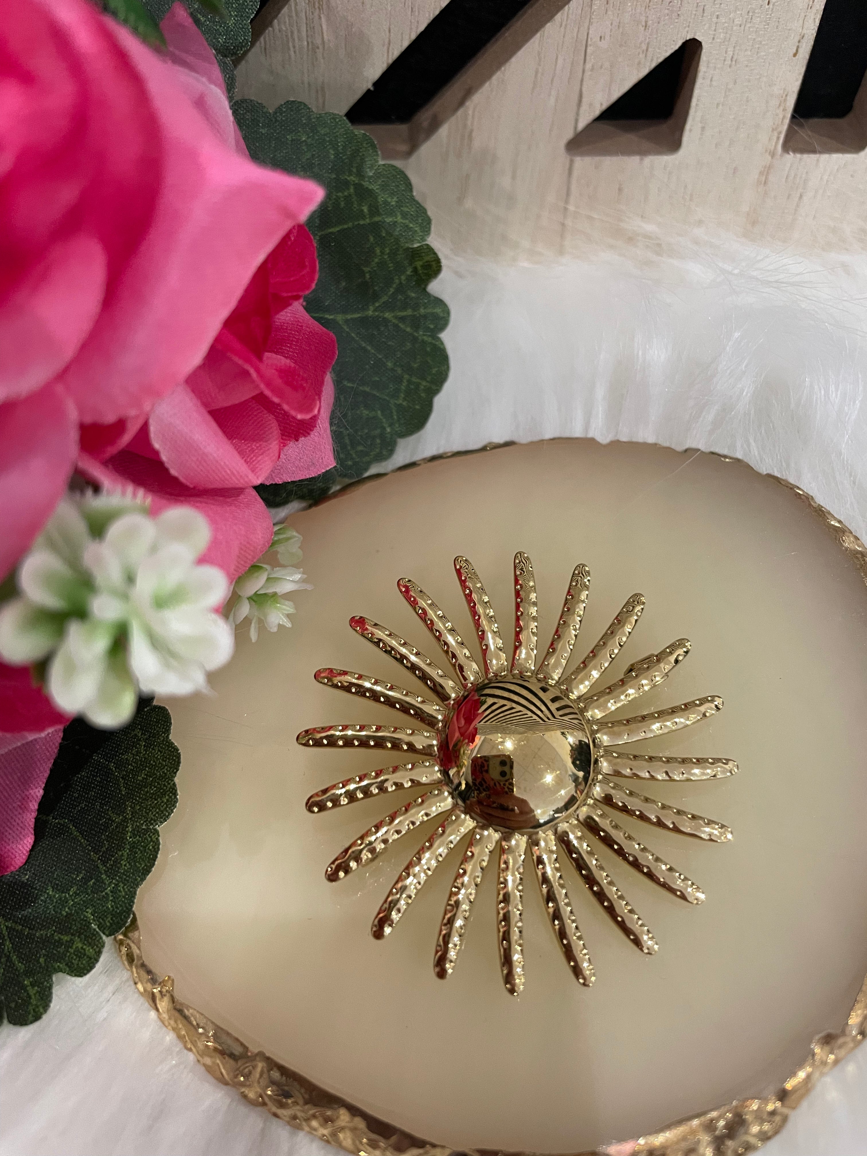 Broche soleil